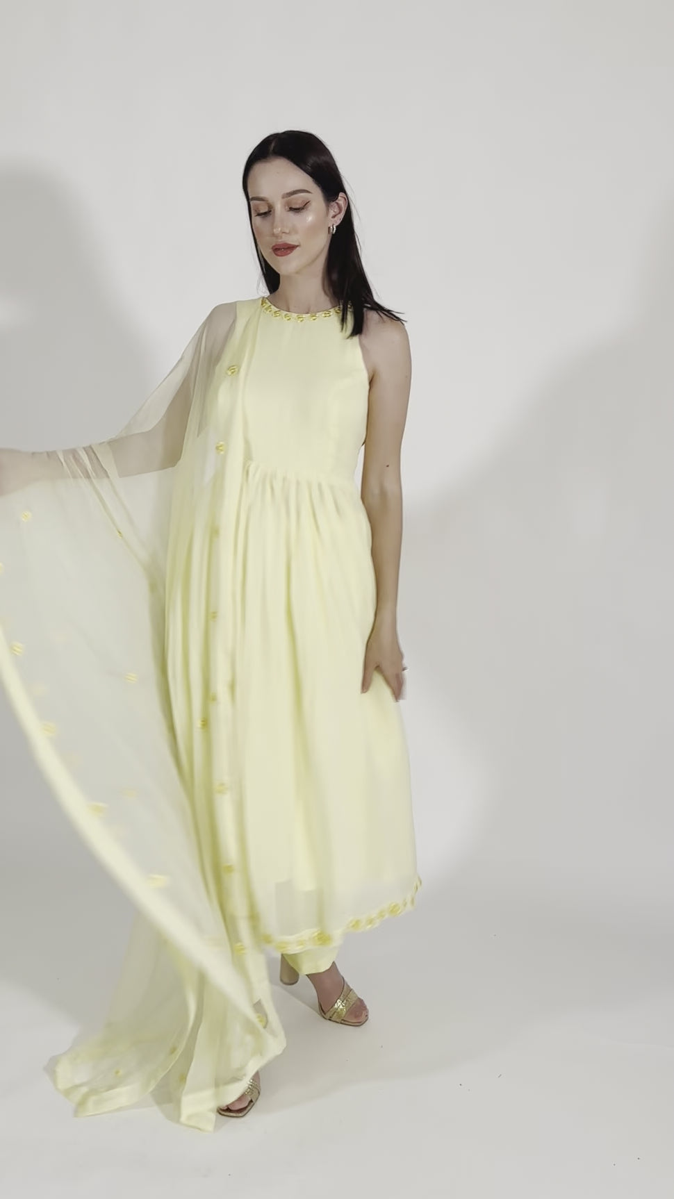 Aveline Yellow Georgette Salwar Kameez with Floral Mirror Trim