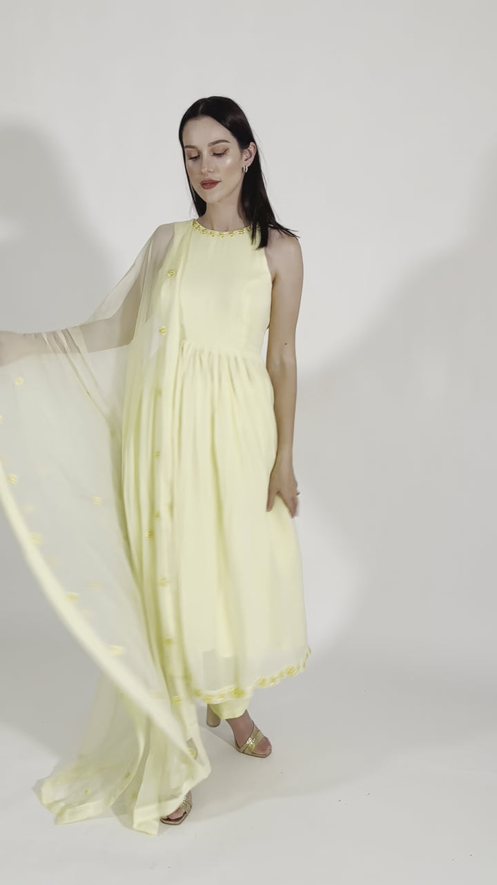 Aveline Yellow Georgette Salwar Kameez with Floral Mirror Trim