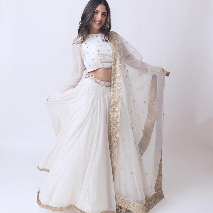 Off White shimmer lehenga  sequins work choli and drape