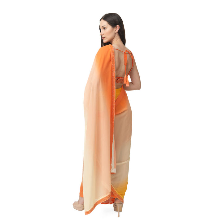 Shaded silk pre-draped saree with hand embroidered blouse