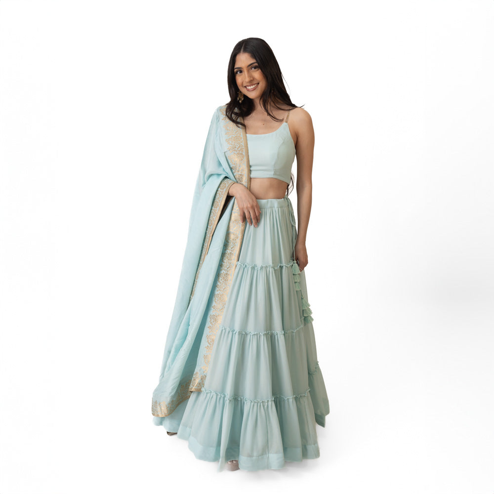 Elvia Sky Blue Shimmer Tiered Lehenga choli with Gold Accents