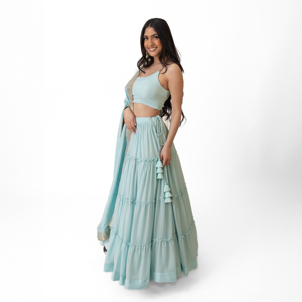 Elvia Sky Blue Shimmer Tiered Lehenga choli with Gold Accents