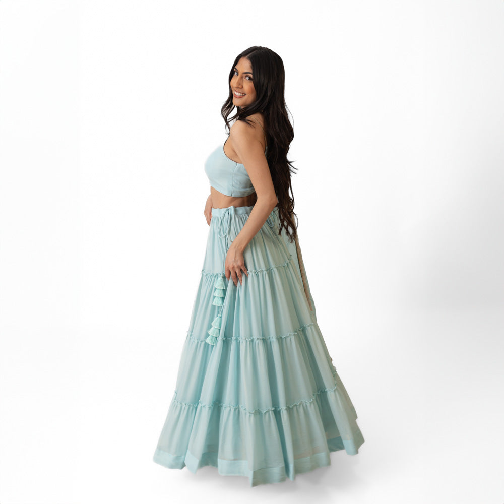 Elvia Sky Blue Shimmer Tiered Lehenga choli with Gold Accents