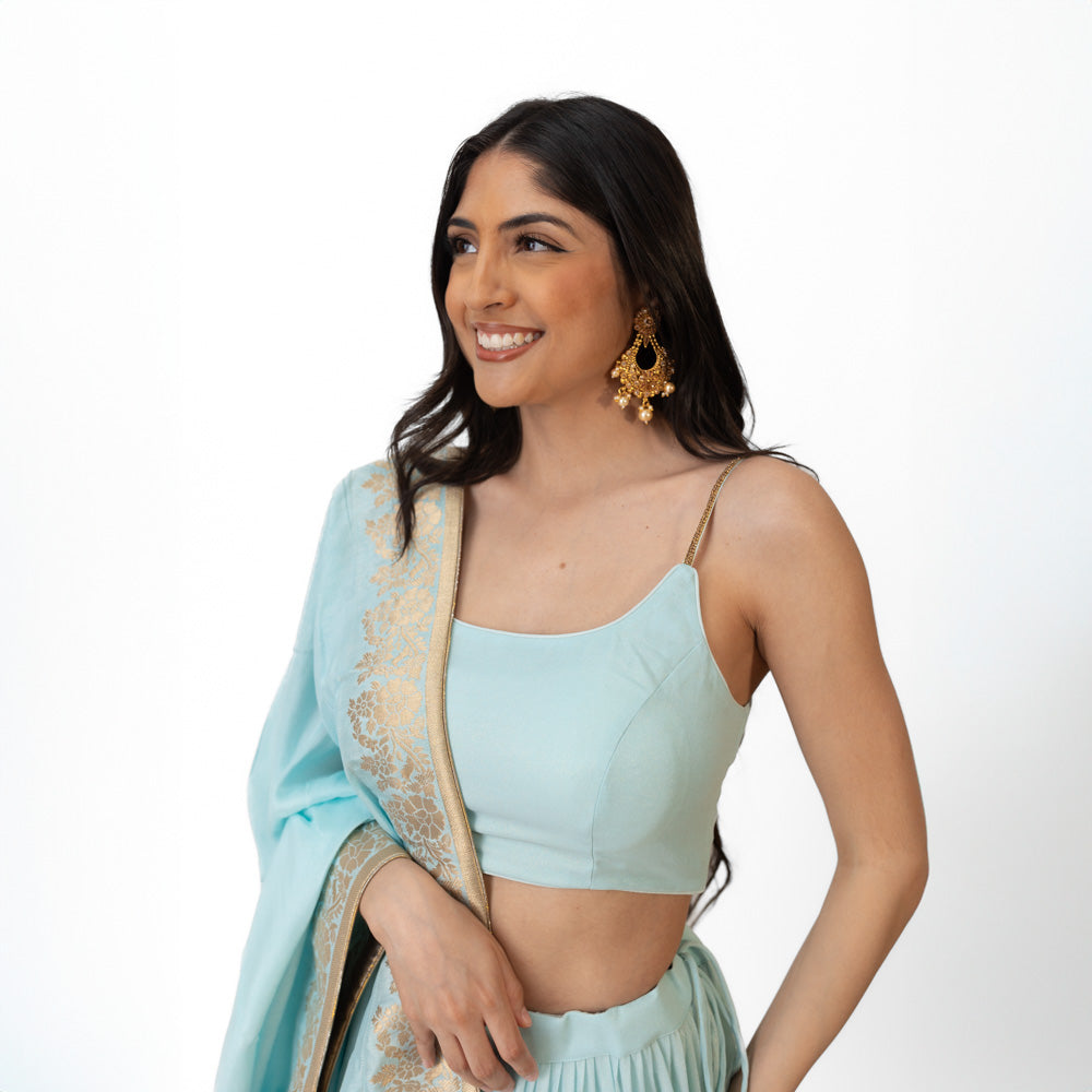 Elvia Sky Blue Shimmer Tiered Lehenga choli with Gold Accents