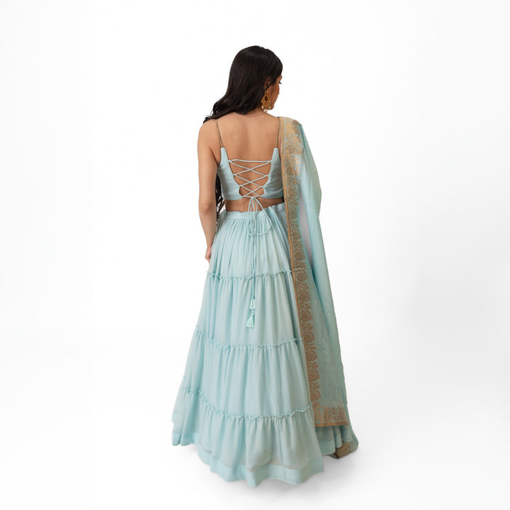 Elvia Sky Blue Shimmer Tiered Lehenga choli with Gold Accents