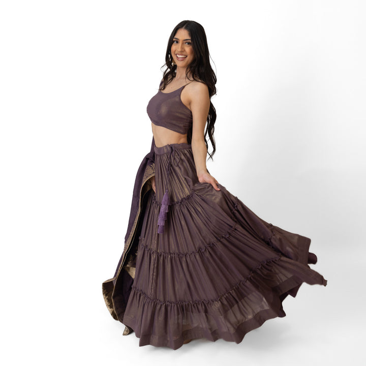 Gaia Brownish Purple Shimmer Tiered Lehenga set with Gold Accents