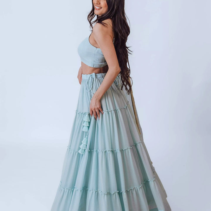 Elvia Sky Blue Shimmer Tiered Lehenga choli with Gold Accents