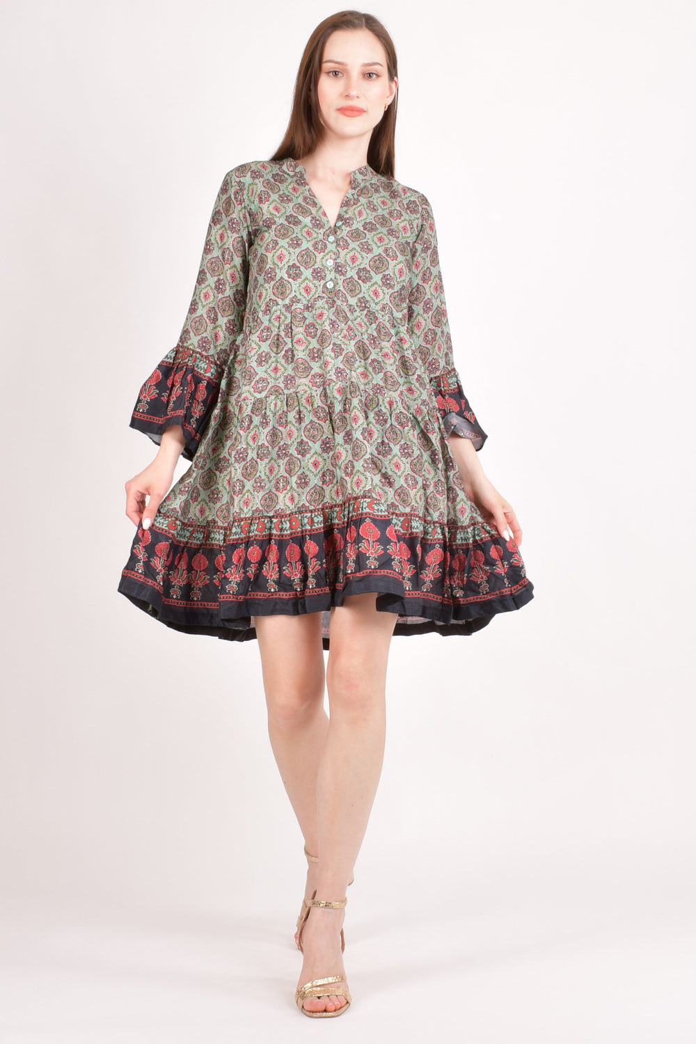 Green muslin silk mini dress with all-over Ajrakh print, front buttons, and butterfly sleeves.