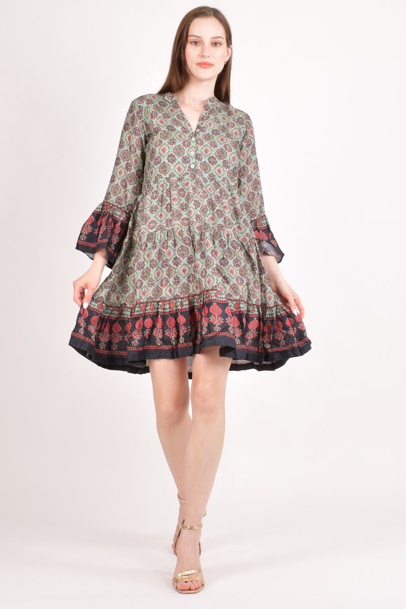 Green muslin silk mini dress with all-over Ajrakh print, front buttons, and butterfly sleeves.