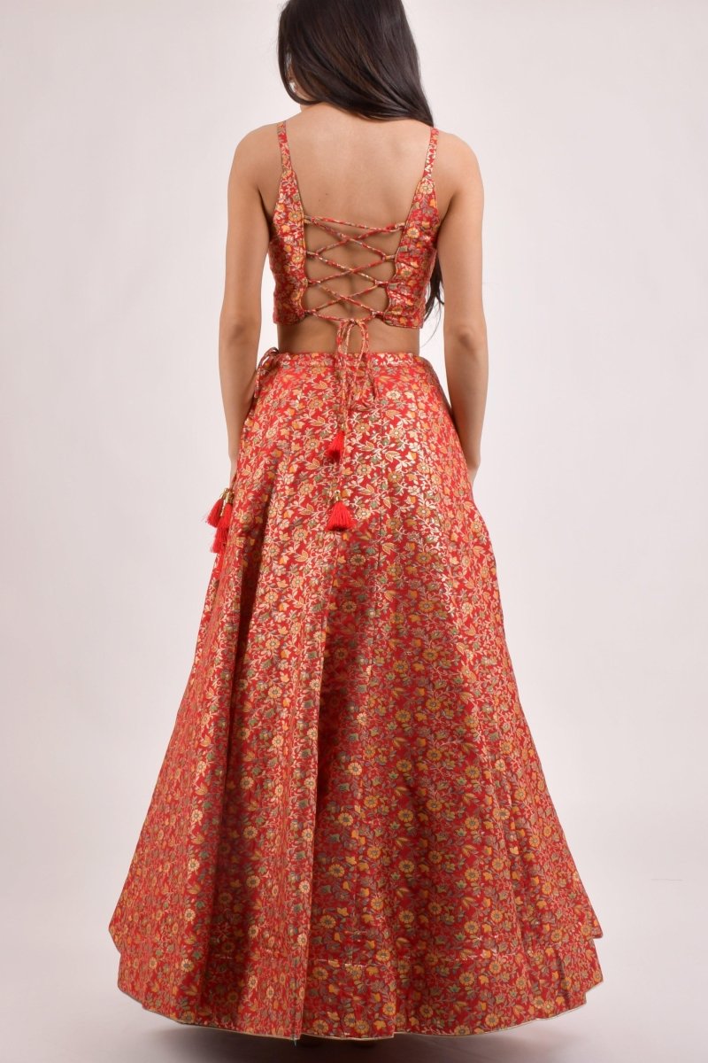 Back view of red Banarasi lehenga choli with lace-up blouse