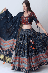 Woman in a navy Bandhani & Ajrakh print silk lehenga choli, blouse, and dupatta, styled for Garba.