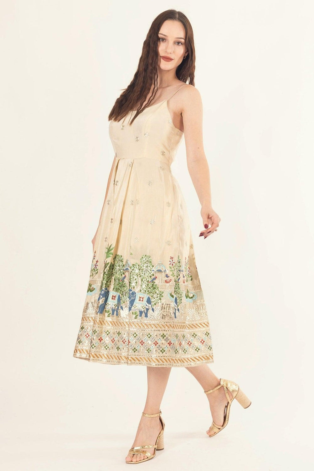 Elegant beige silk midi dress with intricate resham and kasab embroidery, sleeveless, box pleats.
