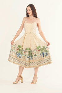 Beige silk midi dress with intricate resham and kasab embroidery, box pleats, and a sleeveless design.