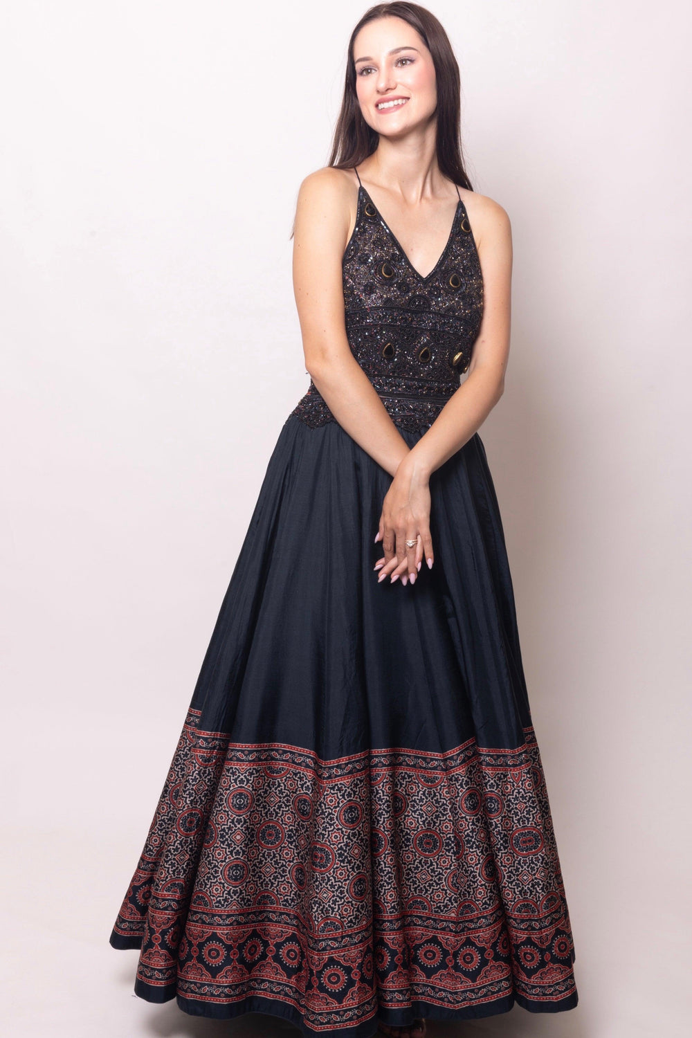 Black silk Ajrakh long dress with heavy hand-embroidered stone and resham work, V-neckline.