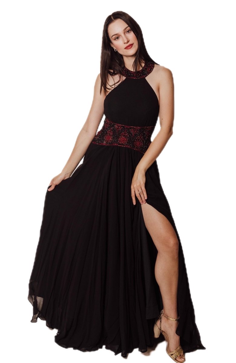 Black georgette halter neck gown with red beaded details at neckline and waist, and a dramatic leg slit.
