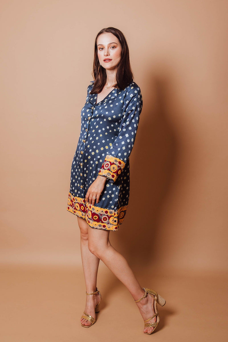 Blue gaji silk blazer dress with all-over bandhej and Kutch-embroidered hem and sleeve ends.