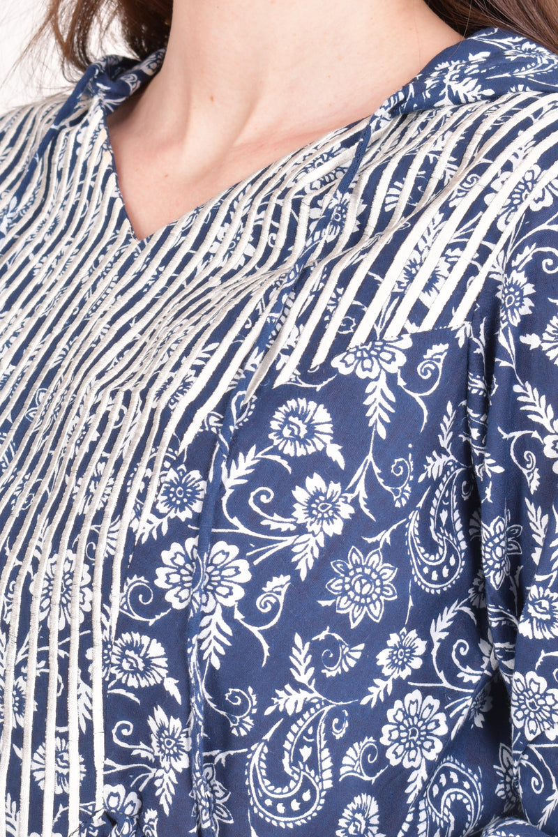 Blue cotton hoodie mini dress with white floral print and resham embroidery on the neckline.