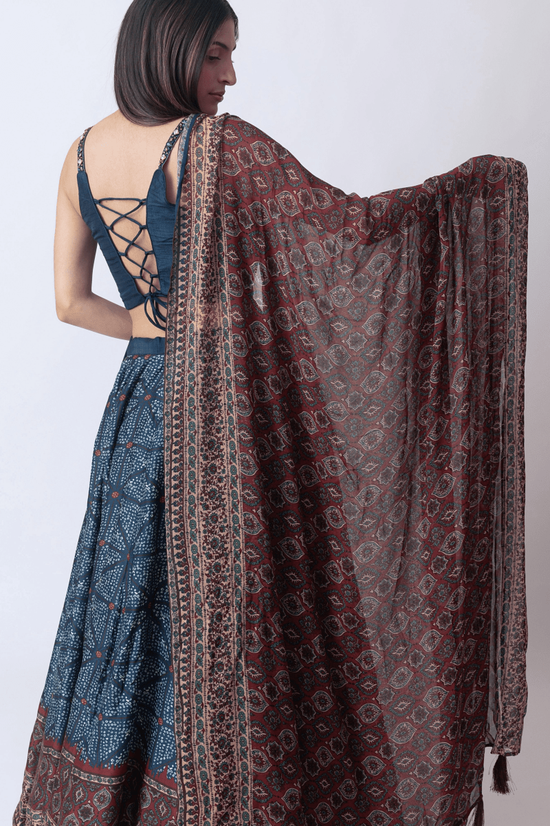 Side view of blue Bandhani lehenga showing 8 to 10 meter flare
