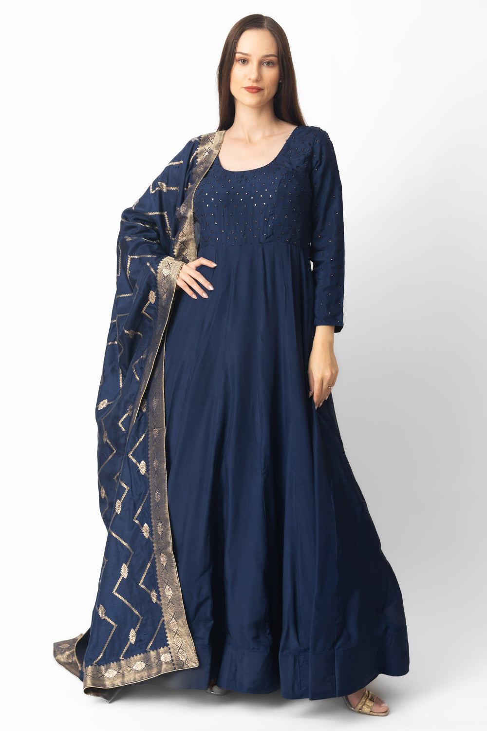 Navy blue silk A-line gown with mirror embroidery and a Banarasi silk drape with gold zari.