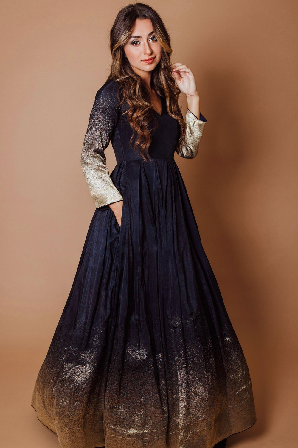 Navy blue silk long sleeve dress with golden border and sleeves.