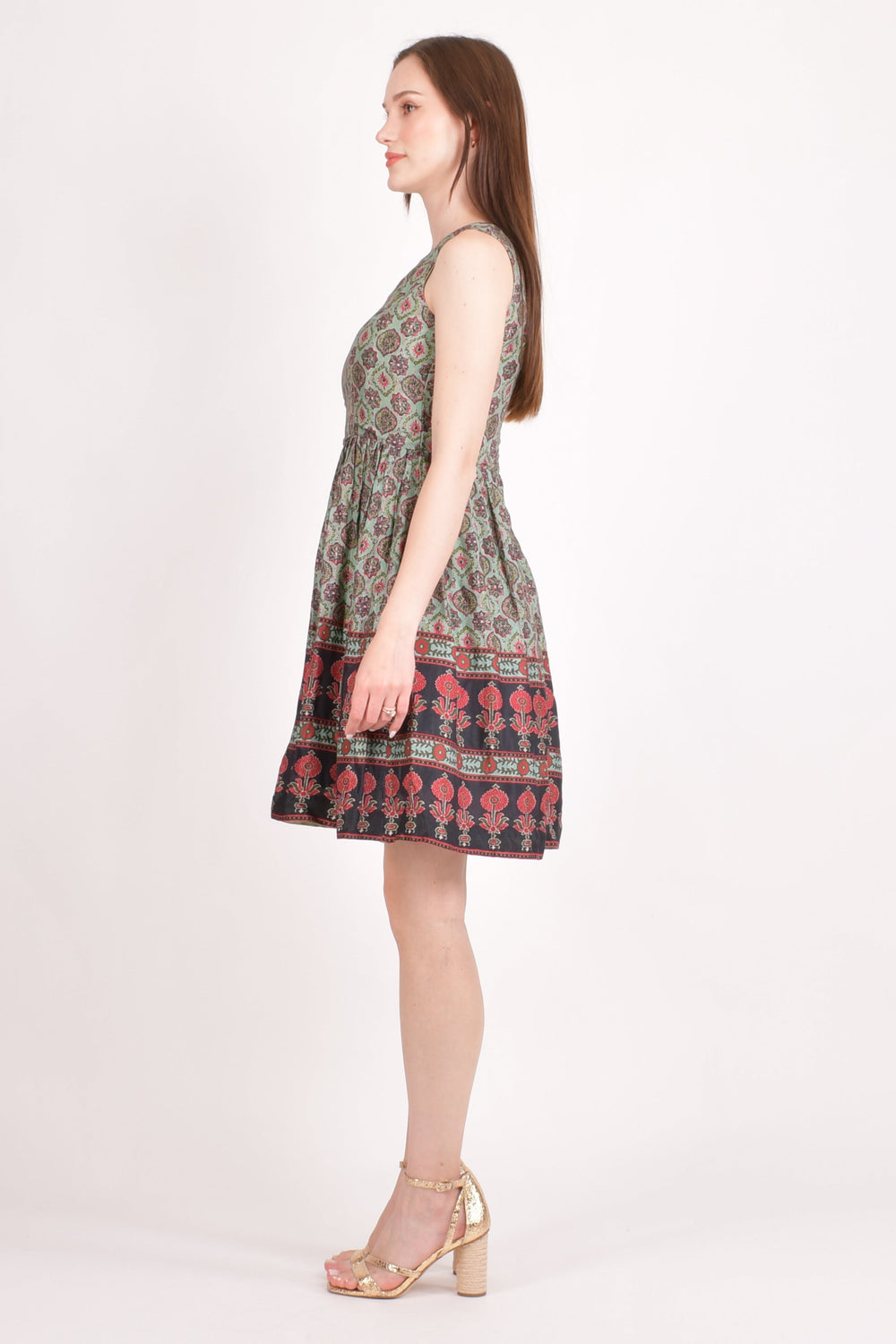 Hazel One Shoulder Mini Dress in green muslin silk with all-over Ajrakh print and red & black floral border.