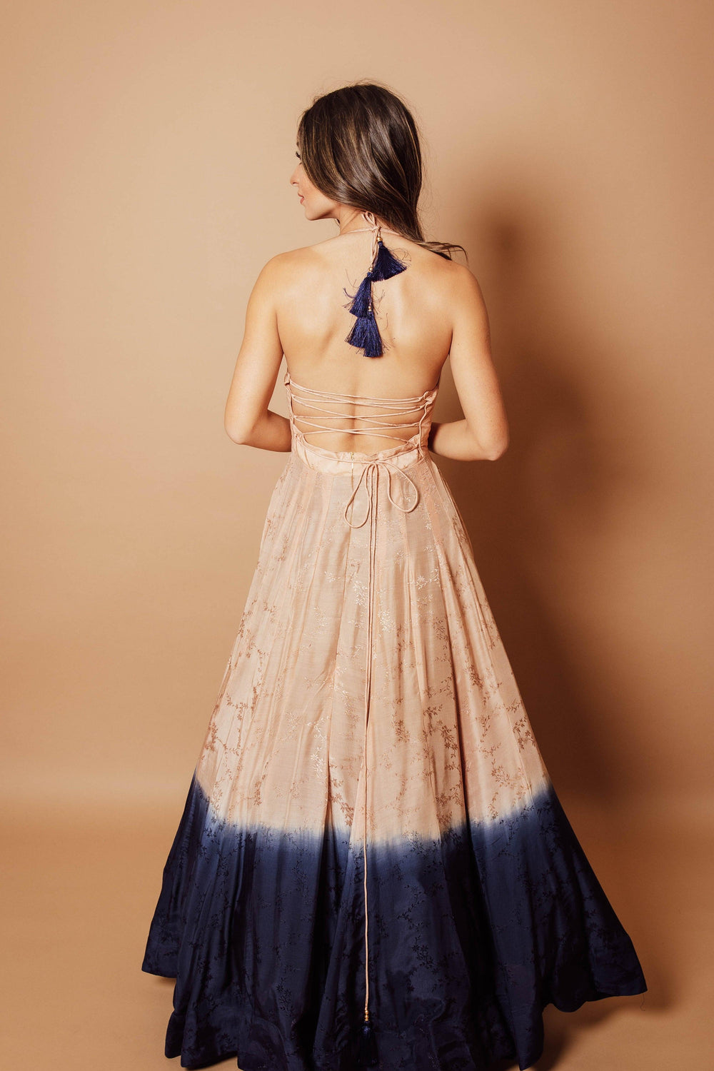 Peach silk jacquard ombre long dress with blue hem, off-shoulder, back zipper, and tassel details.