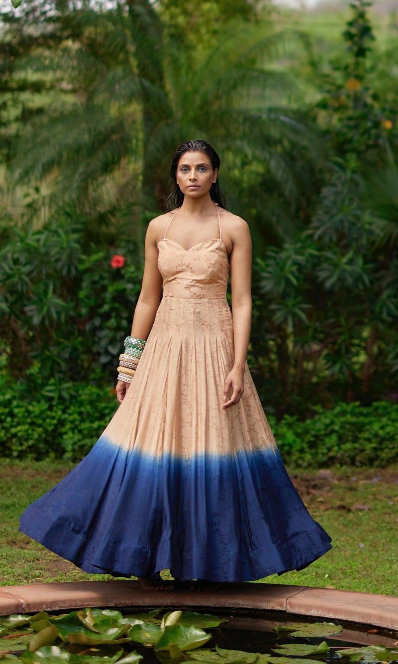 Silk jacquard ombre long dress, peach transitioning to blue, with an off-shoulder design.