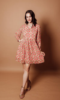 Floral Georgette V-Neck Mini Dress in coral, pink, and sage geometric print with long sleeves.