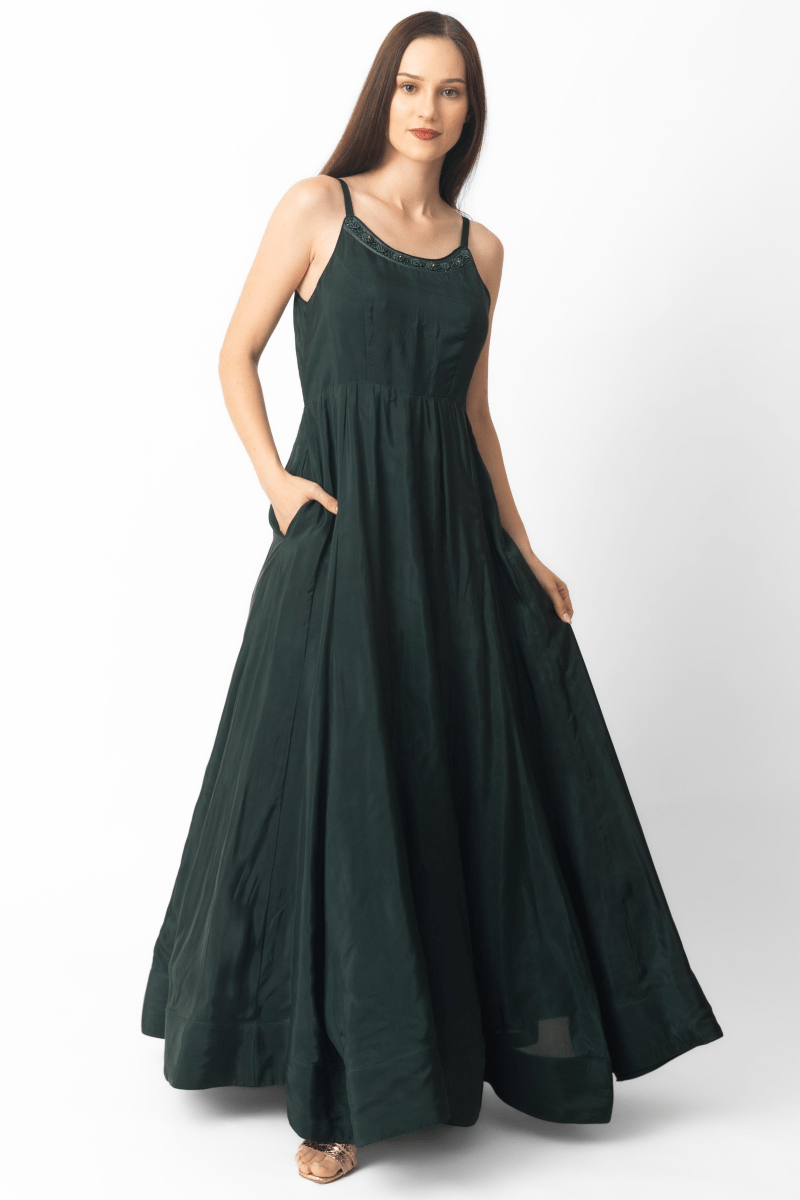 Mirena Green A-Line Long Dress in silk, sleeveless with resham embroidered neckline and pockets.