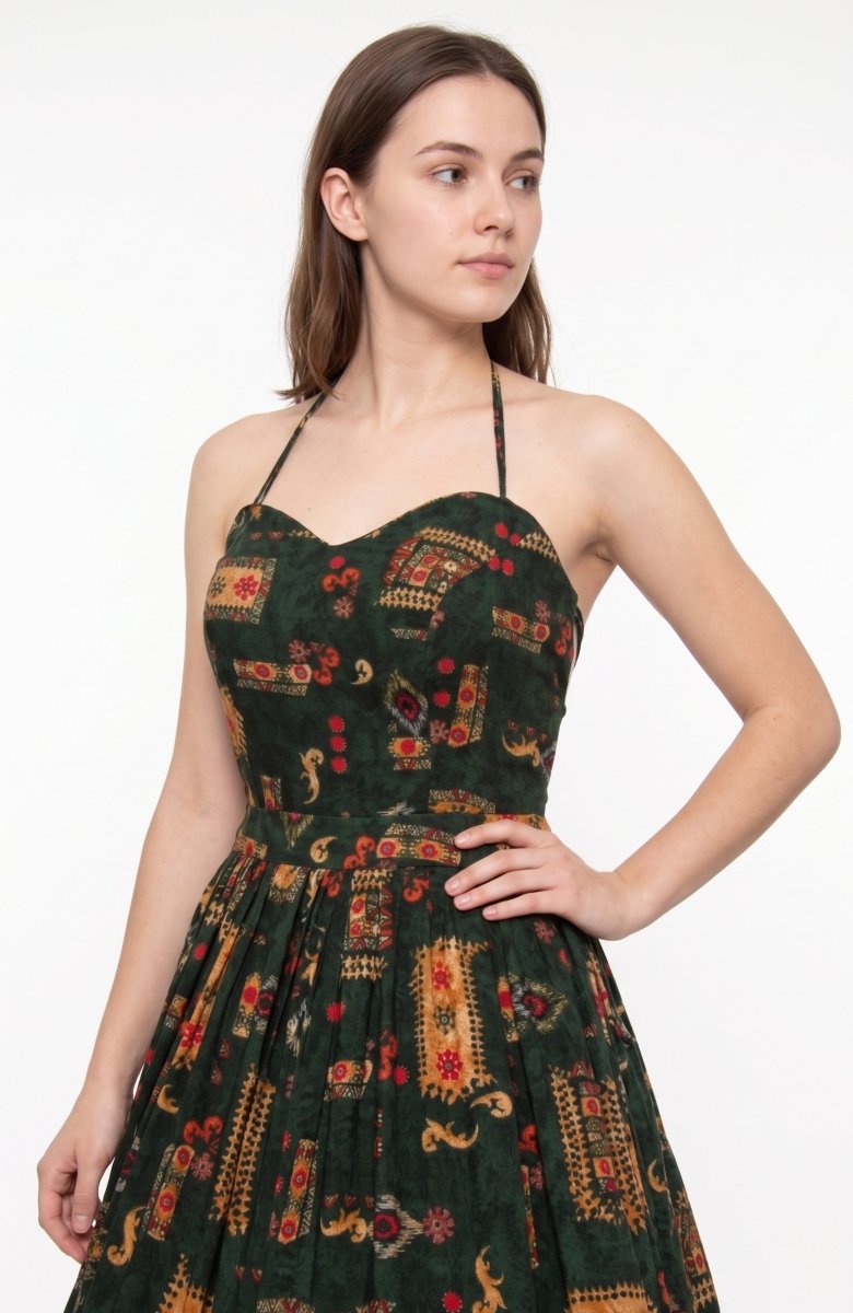 Green rayon maxi gown with ethnic motif print, sweetheart neckline, and cinched waist.