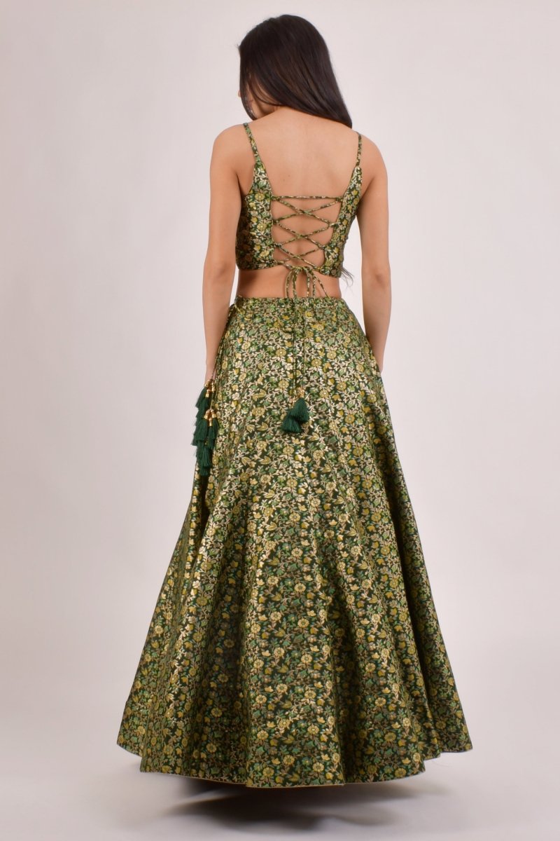 Back view of green floral Banarasi lehenga with lace-up blouse and matching dupatta for mehendi - RAAS