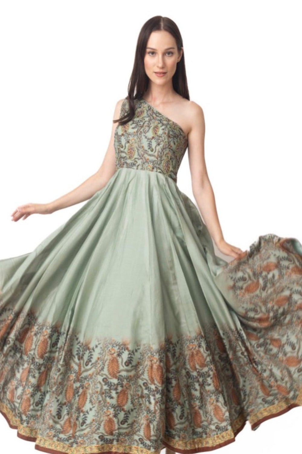 Green floral hand-embroidered one-shoulder gown with a flowing skirt and paisley border.