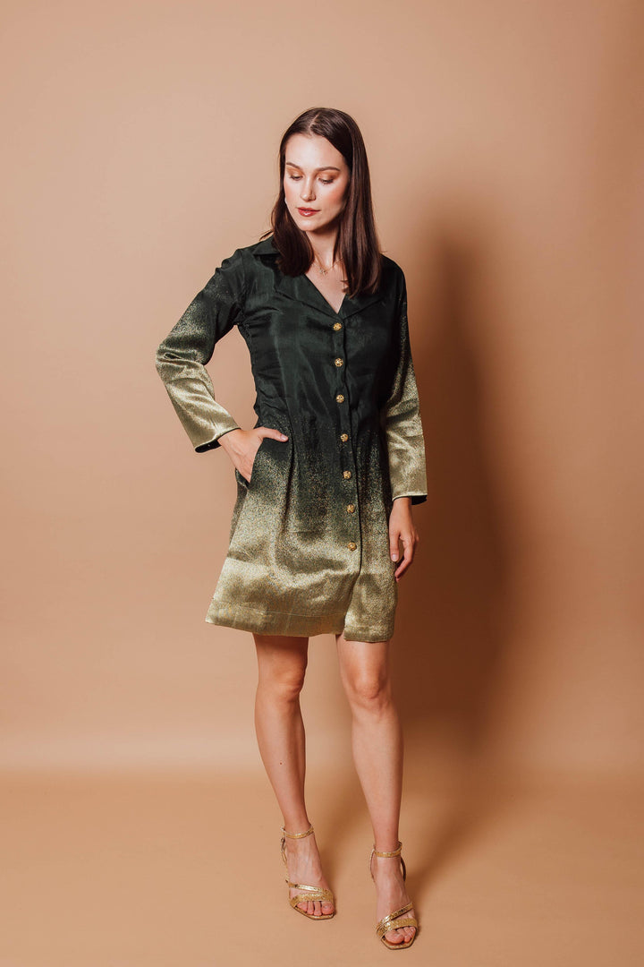 Front photo a model wearing Raas green blazer dress