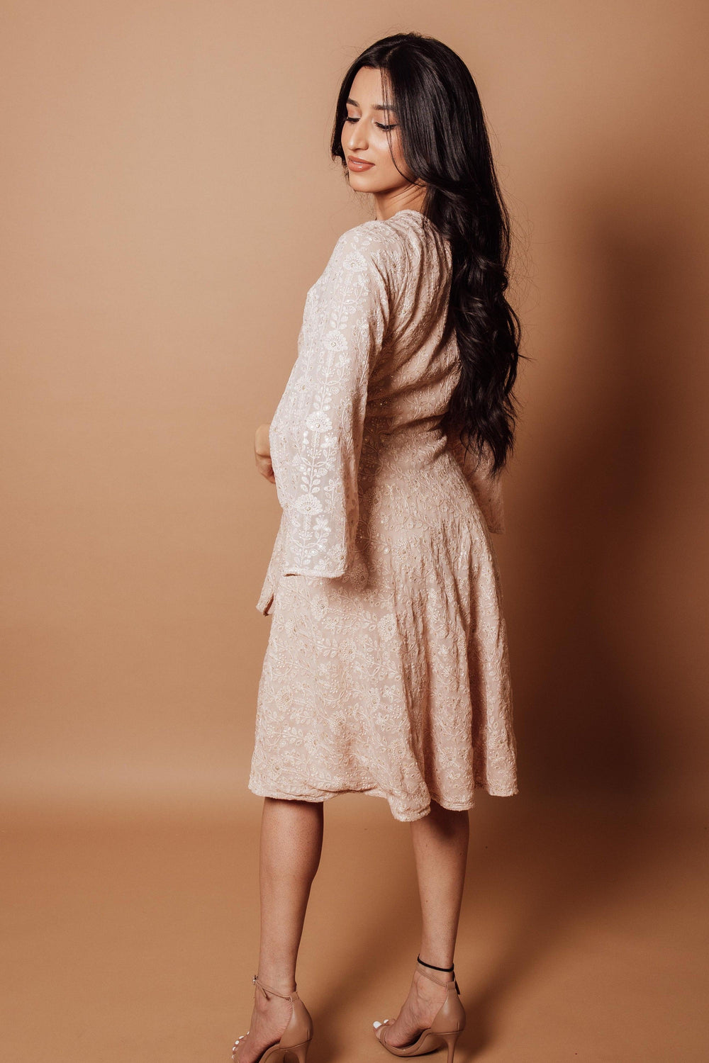 Karina Wrap Dress in georgette with all-over sequin embroidery, shown from the back.