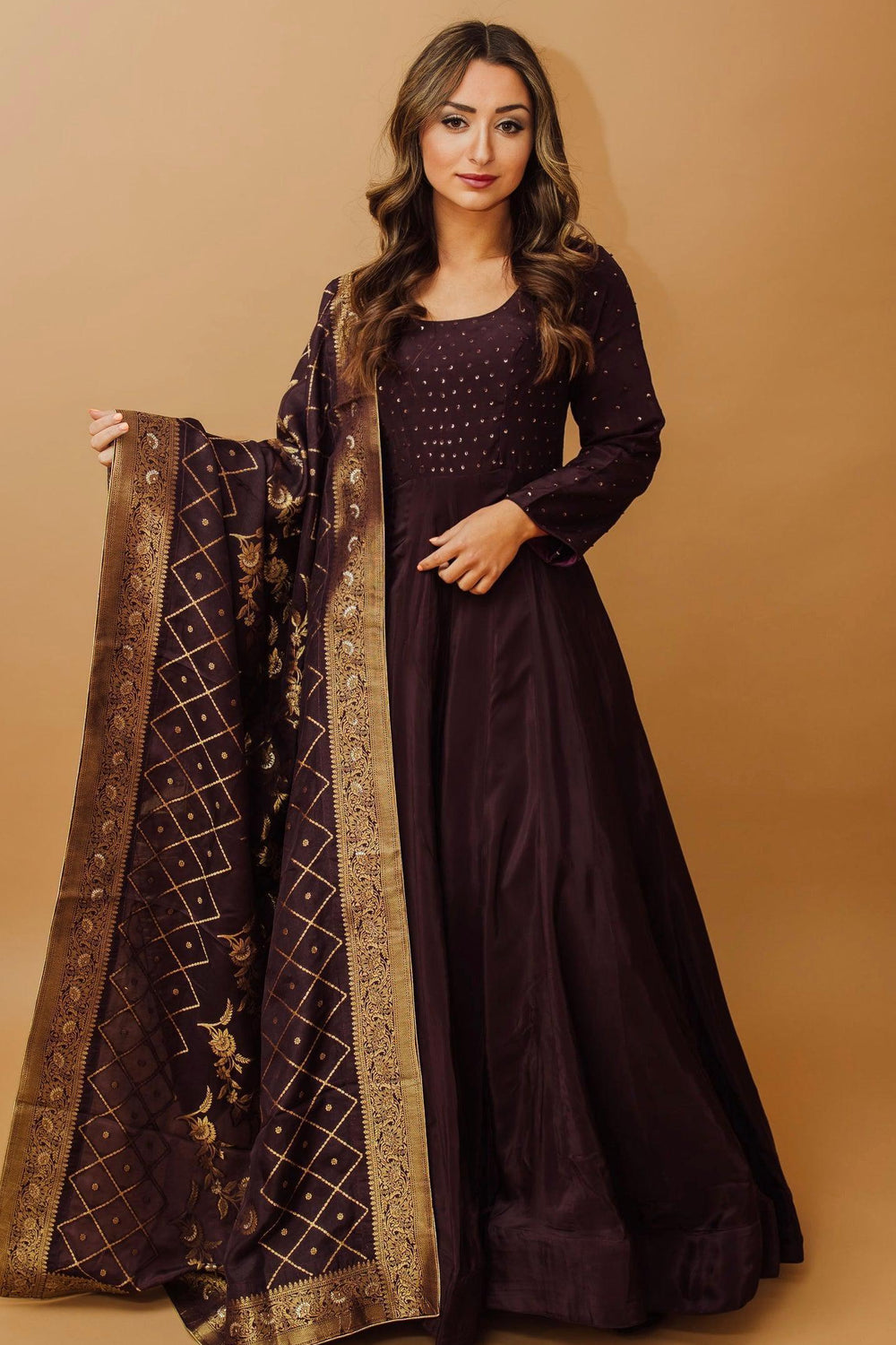 Klarina Wine Gown: full-sleeve silk gown with sequins, Banarasi silk dupatta with gold zari.