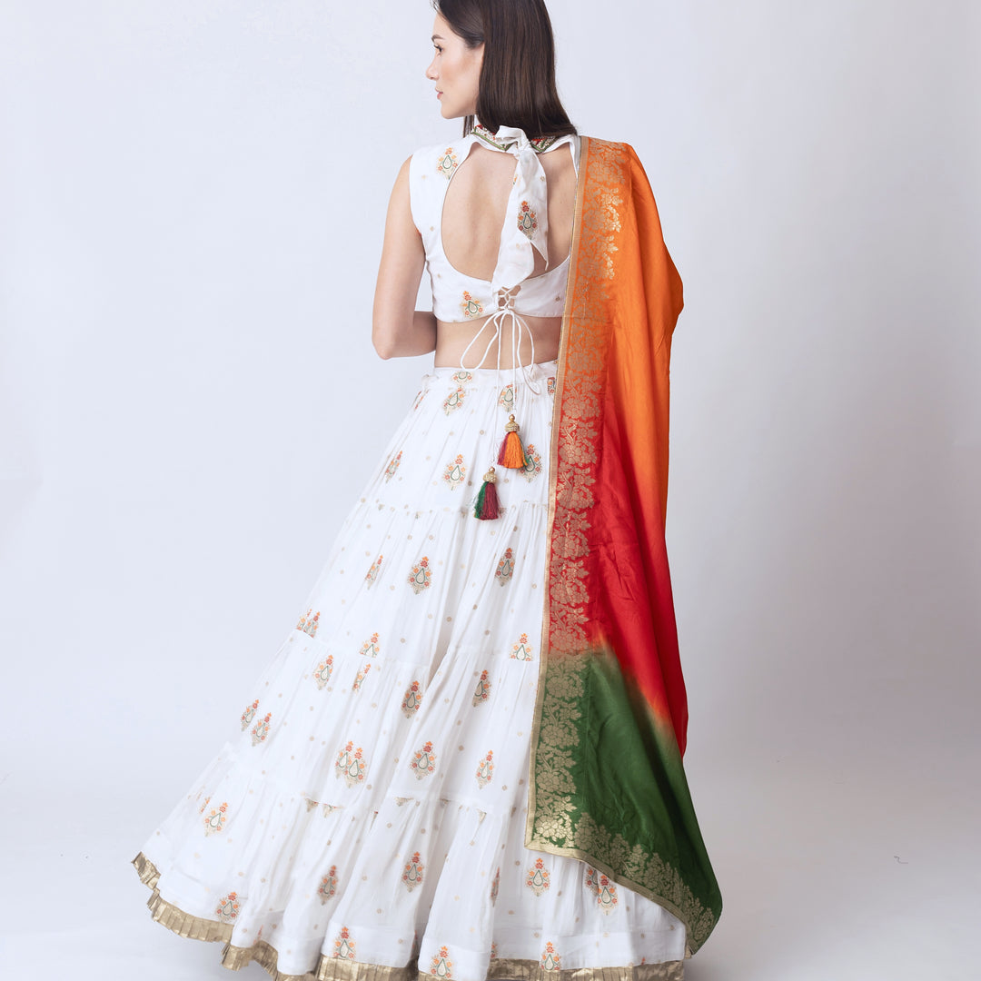 Rose White lehenga with embroidered high neck choli and multi color dupatta