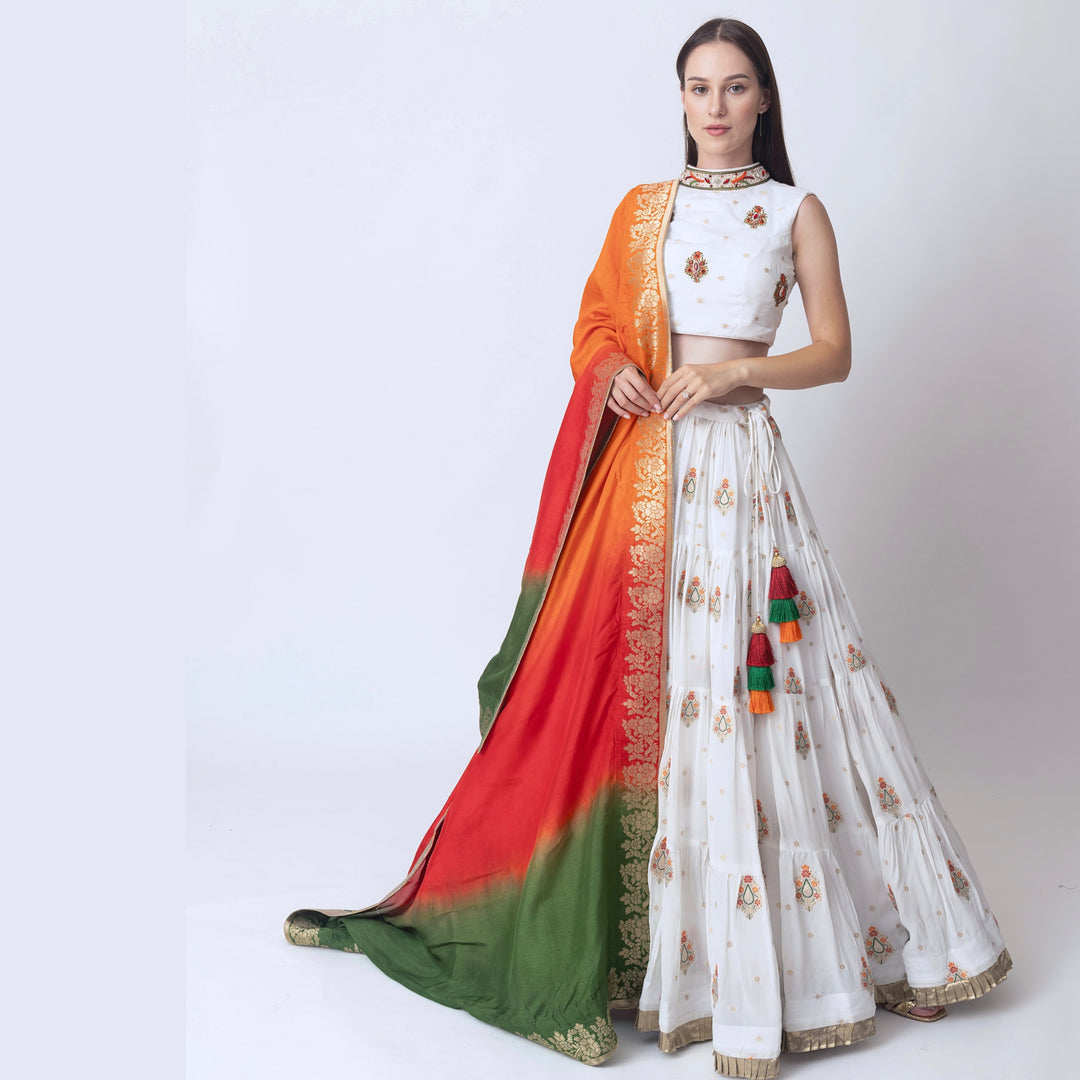 Rose White lehenga with embroidered high neck choli and multi color dupatta