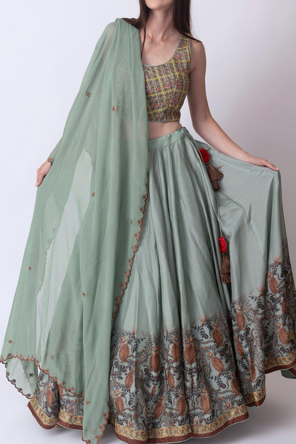 Side view of pista green lehenga showing silhouette and flare