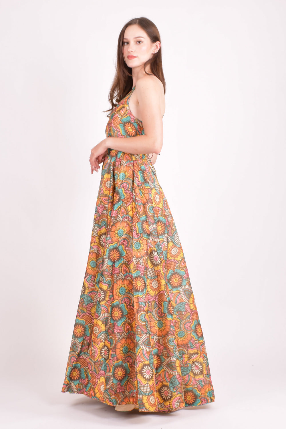 Viscose long dress with an all-over colorful mandala pattern, sequins, and an open back with string tie.