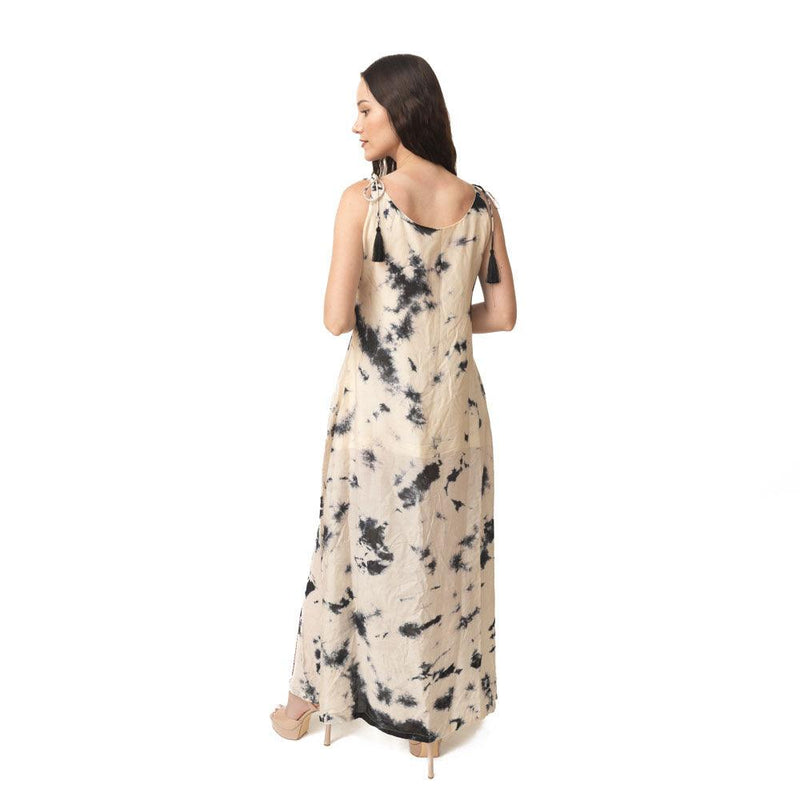 Off-white tie-dye long dress with black patches, scoop neck, and shoulder tassels.