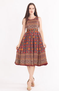 Maroon silk midi dress with all-over Ajrakh print and an embroidered belt.