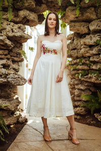 Off-white raw silk midi strapless dress with resham and mirror hand embroidery on the torso.