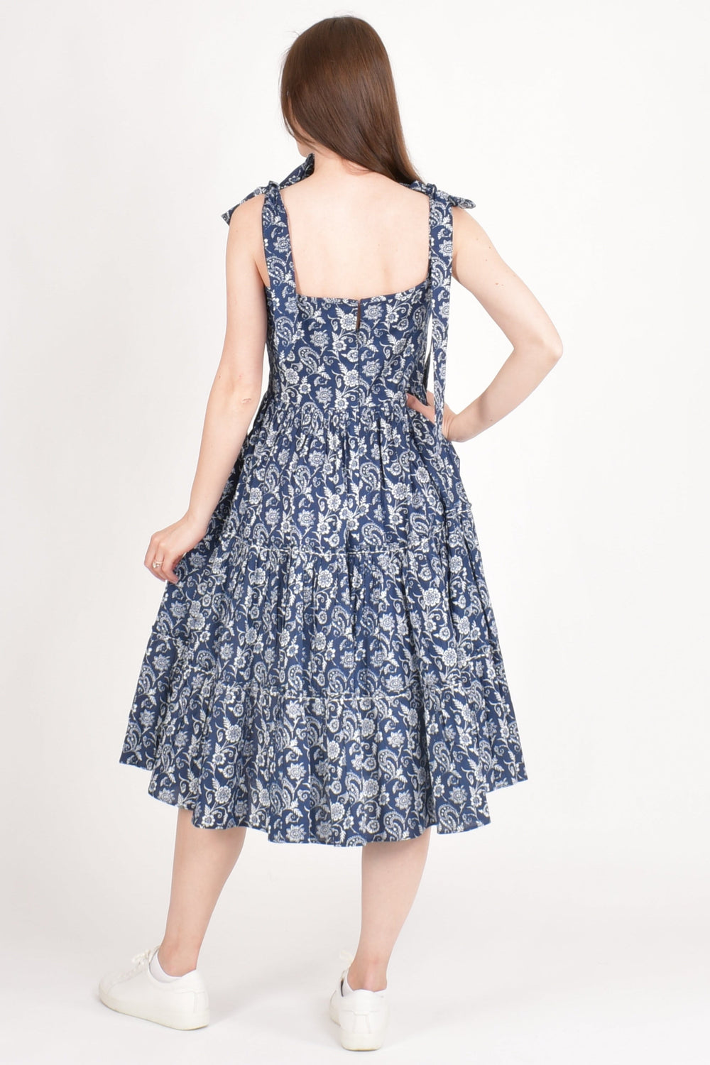 Mila Blue Tiered Midi Dress, cotton, with all-over floral print, bow-tie shoulder straps, and fit-and-flare silhouette.