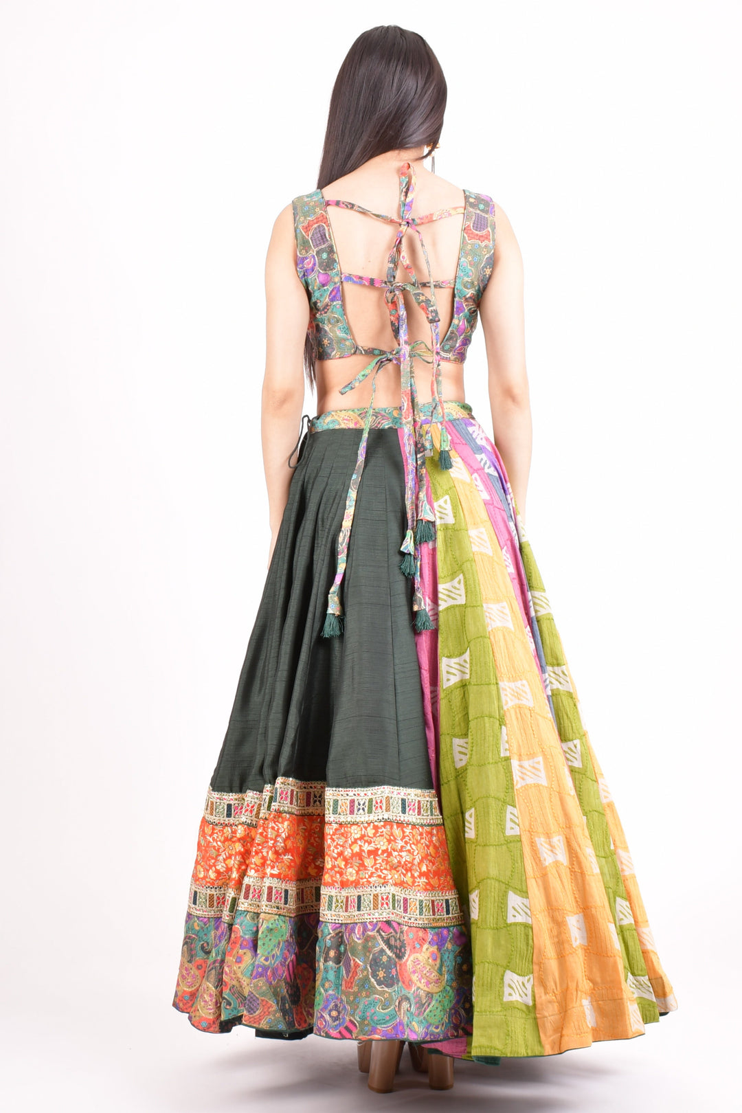 Woman from behind in a Mul Cotton Full Flare Multi color Chaniya Choli with a lace-up back blouse, perfect for Garba.