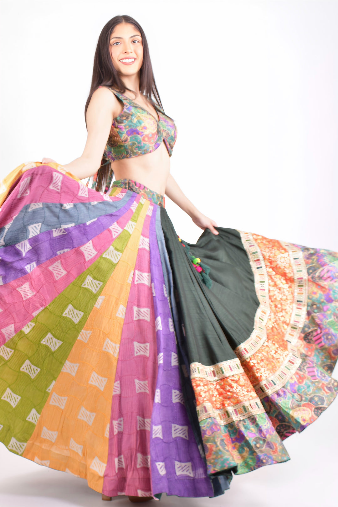 Woman in a dramatic twirl, showcasing a vibrant mul cotton full flare multicolor Chaniya Choli, ideal for Garba.