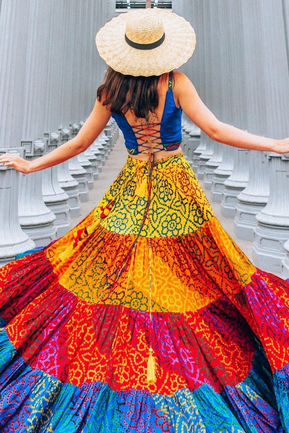 Side view of multi tropical tiered chaniya choli showing skirt movement