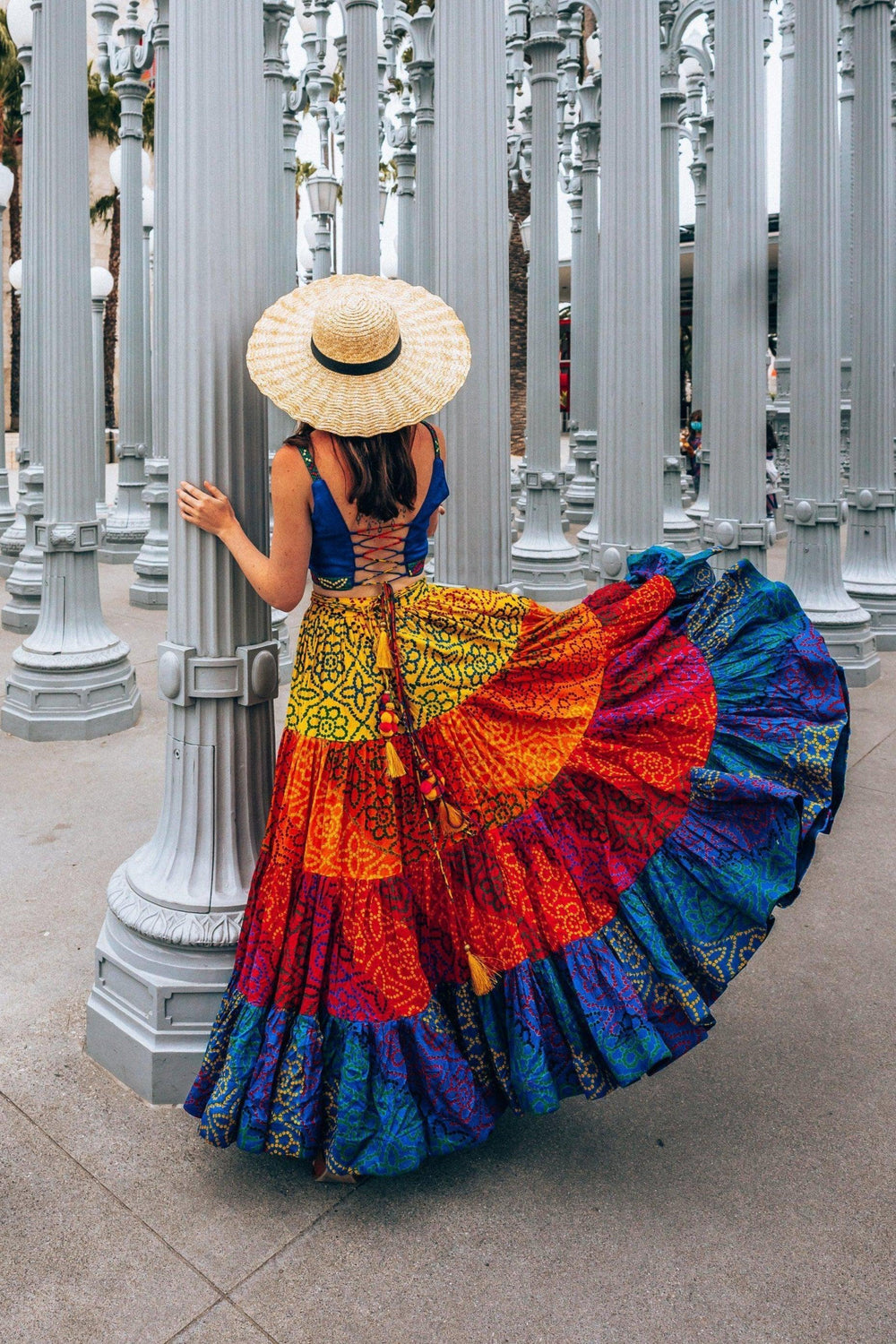 Back view of multi tropical tiered chaniya choli with embellished blouse