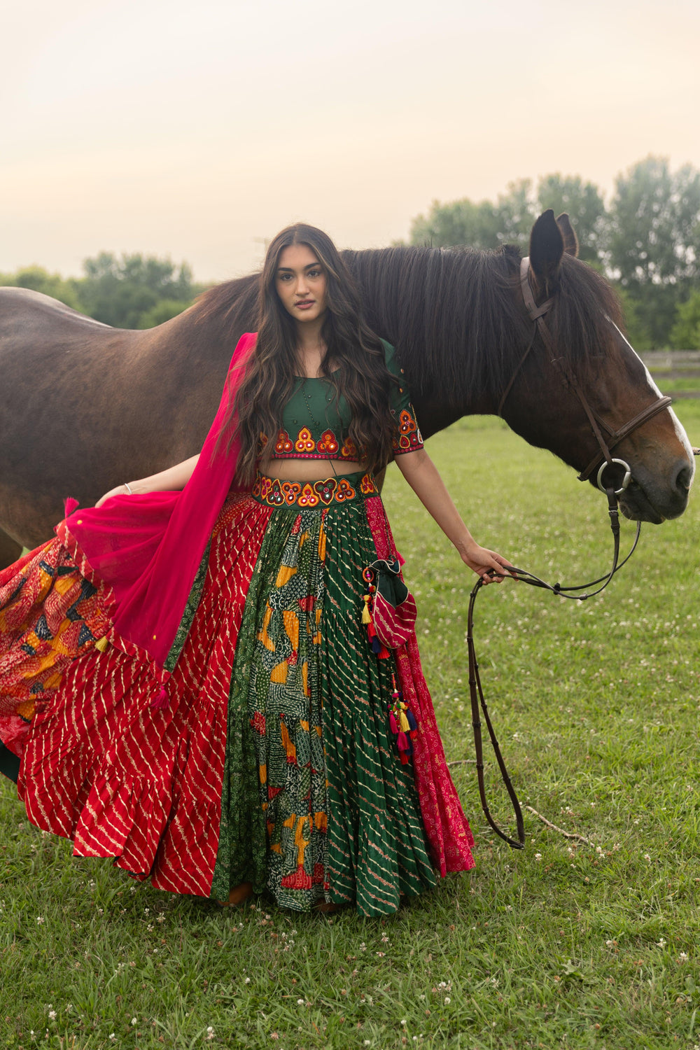Multicolor full flare Chaniya Choli set with green blouse, red and green cotton-silk chaniya, and pink georgette dupatta.