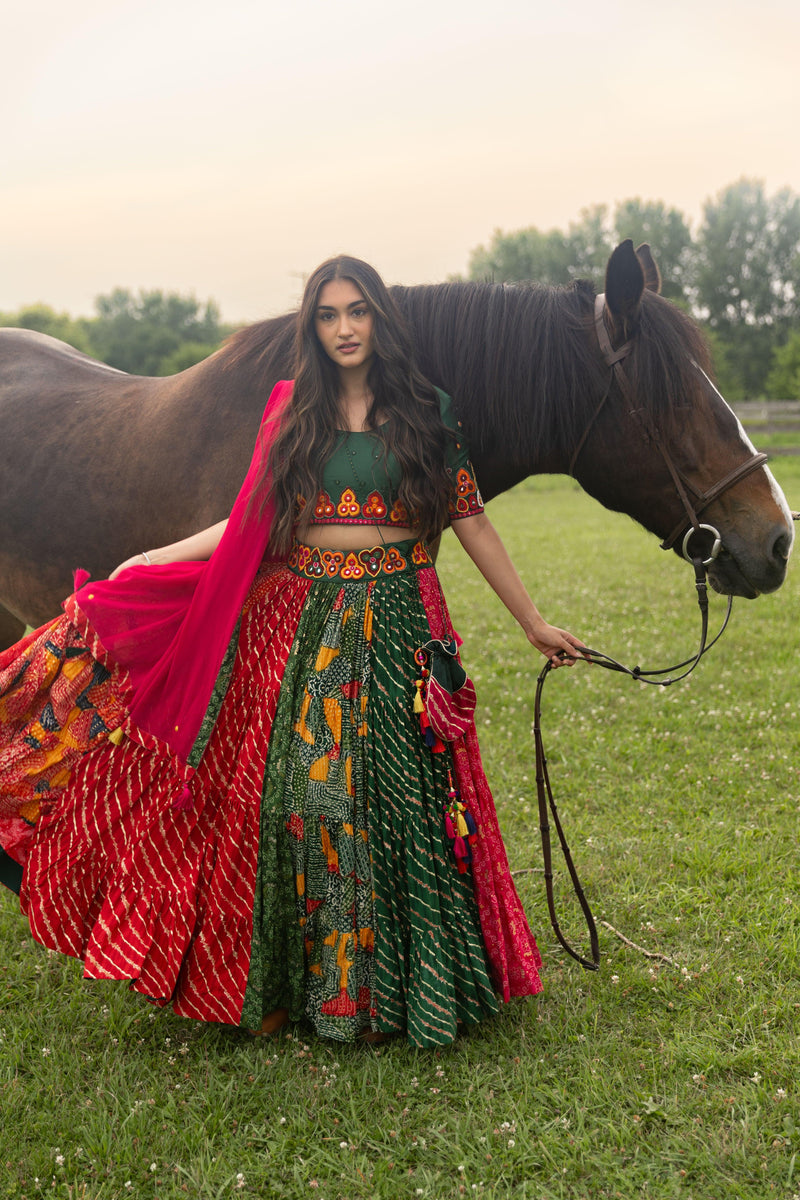 Multicolor full flare Chaniya Choli set with green blouse, red and green cotton-silk chaniya, and pink georgette dupatta.