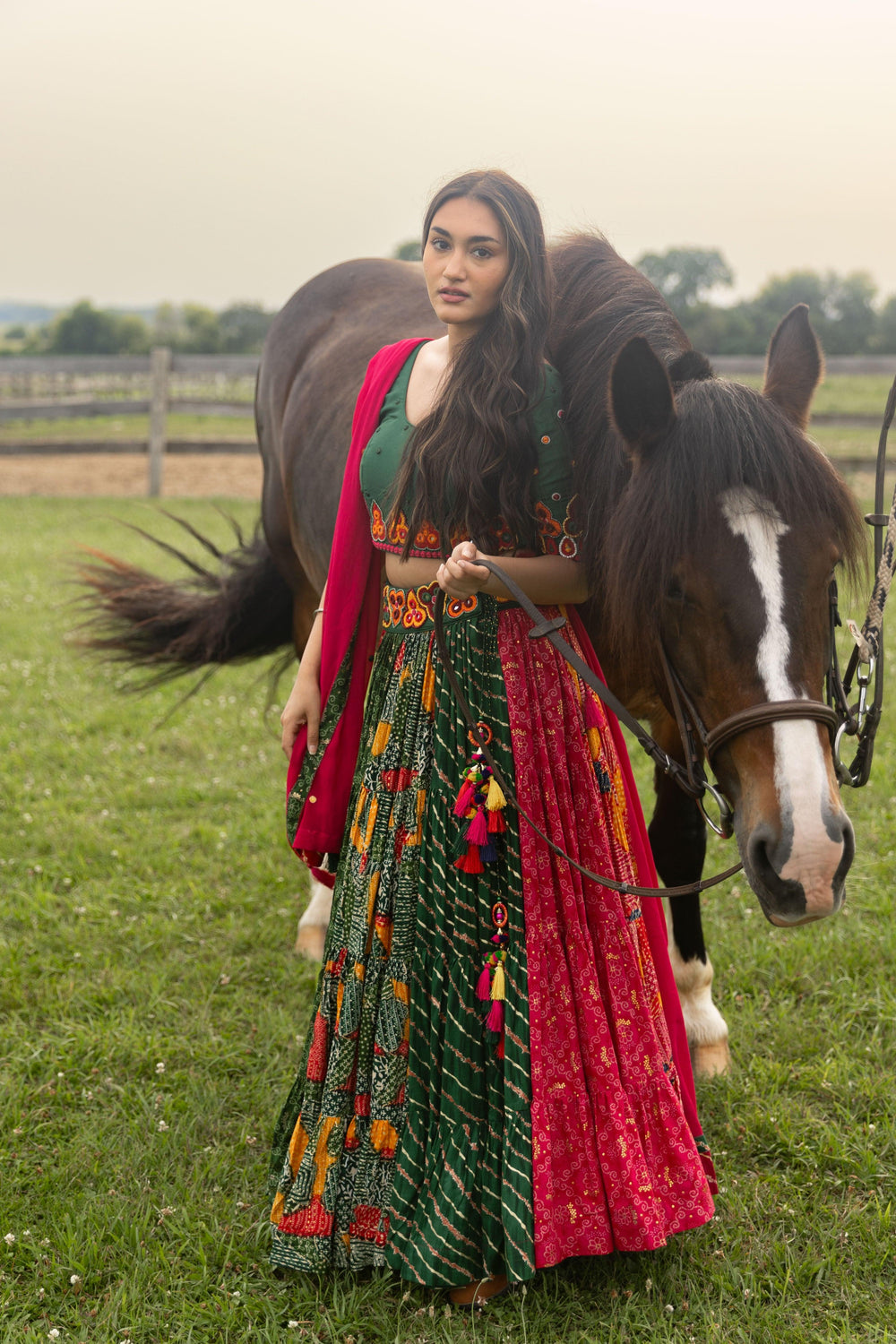 Multicolor full flare Chaniya Choli set with green blouse, red dupatta, and printed cotton-silk skirt.